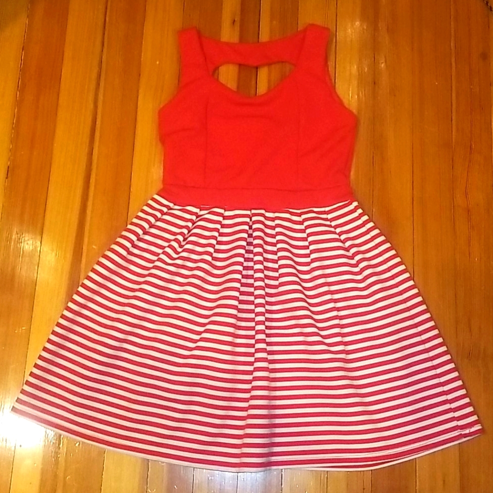 Super cute red striped dress. Heart shape in back